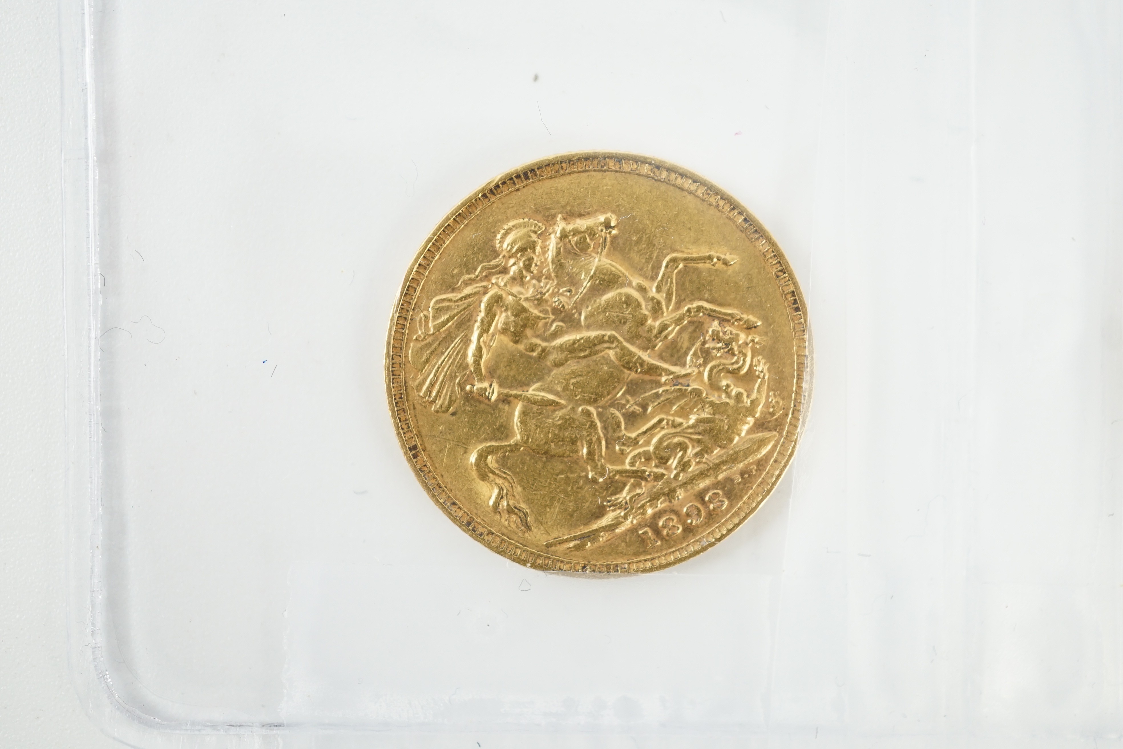 Two gold sovereigns, Victoria 1898M and Edward VII 1910, a George V half sovereign 1913 and a France gold 10 francs 1900 (test mark to portrait).